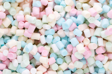 Background or texture of colorful mini marshmallows. - obrazy, fototapety, plakaty