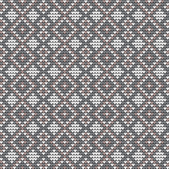 Knitted seamless pattern in vector.