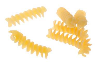 isolated curled yellow pieces of macaroni