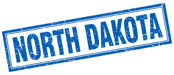 North Dakota blue square grunge stamp on white