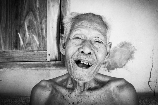 Portrait of elderly men happy and laughing ,black and white tone