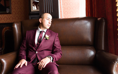 Portrait of the groom on their wedding day.