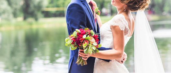 Bride and groom on their wedding day outdoors