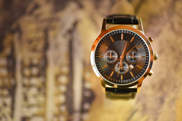 Luxury watch with blurry background in available light