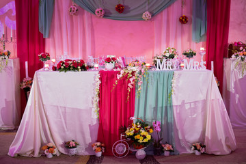 Beautiful wedding table with Mr. & Mrs. in natural light