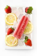 Strawberry popsicle on white background
