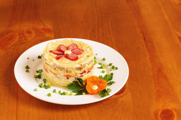Fresh salad with mayonnaise, sausage,  potatoes, pepper