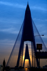 Bhumibol Bridge, Bangkok, Thailand. The beautiful silhouette light evening on the bridge at Bangkok capital of Thailand.