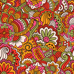 Fototapeta na wymiar Hand drawn seamless pattern with floral elements. Colorful ethnic background. Pattern can be used for fabric, wallpaper or wrapping