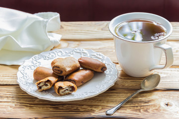 Rolls of biscuit dough with chocolate.