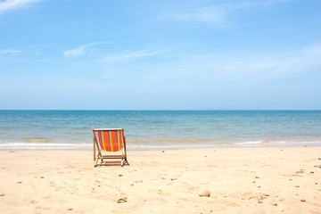 Deckchair, chair on the beach in sunshine day.