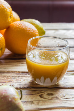 Glass of healthy orange and lemon juice drink 
