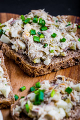 Sandwiches with a paste of smoked fish, cucumber, egg and mayonnaise
