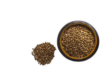 Clay saucepan with buckwheat groats