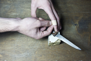 hand and knife