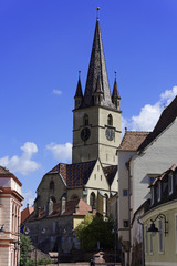 Fototapeta na wymiar Evangelical Cathedral Sibiu Romania tower with blue sky