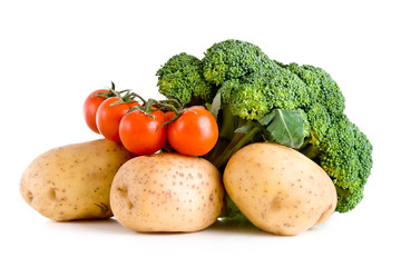 Fresh vegetables over white