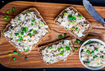 Sandwiches with a paste of smoked fish, cucumber, egg and mayonnaise