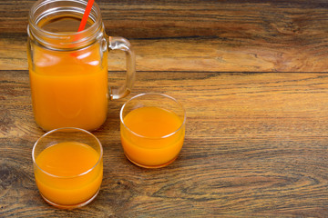Healthy food: pumpkin juice, apple, orange, multifruit.