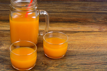 Healthy food: pumpkin juice, apple, orange, multifruit.