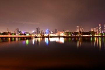 Fototapeta na wymiar Business Bay Bridge and walk at night with long exposure, Dubai, UAE