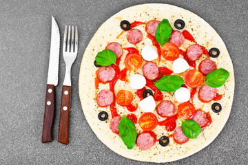 Pepperoni Pizza with Sausage, Cheese, Mozzarella, Olives and Bas