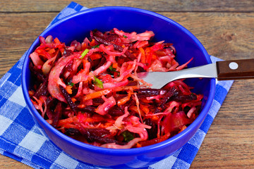 Healthy and Diet Food: Salad with Beets, Onions, Carrots