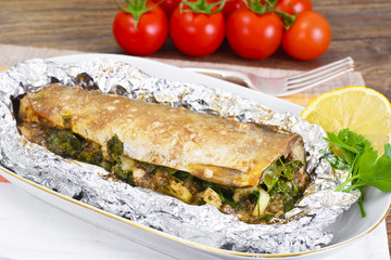 Mackerel Stuffed with Celery and Parsley in a Sauce of Coconut M