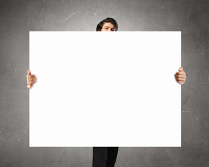 Businessman showing empty banner