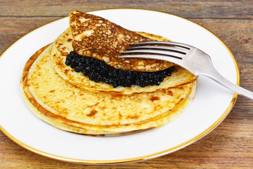 Pancakes with Black Caviar