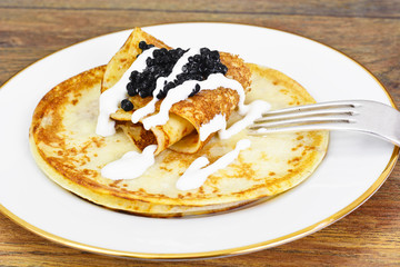 Pancakes with Black Caviar