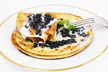 Pancakes with Black Caviar