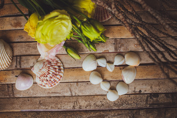 eustoma and  seashells in the shape of heart