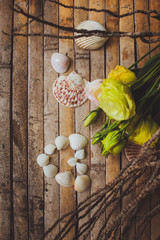 eustoma and  seashells in the shape of heart