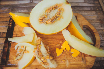 yellow melon Cantaloupe  slices with shape heart