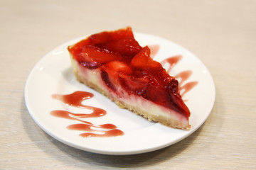 Strawberry cheesecake on a white plate