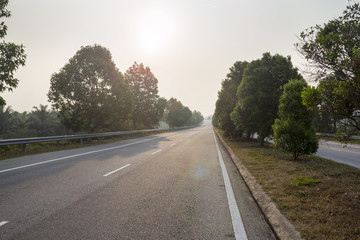 Empty highway road blue sky in sunrise morning, rural countryside speedway route for motion trip