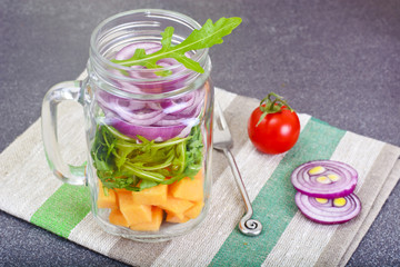 Salad with Pumpkin, Arugula and Red Onion in Glass Jar