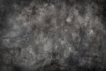 Dark grunge textured wall with vignette