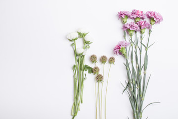 Spring flowers, cloves and buttercups.