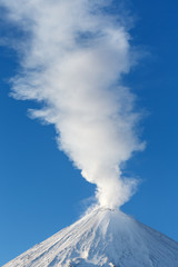 Winter view of top of volcano eruption