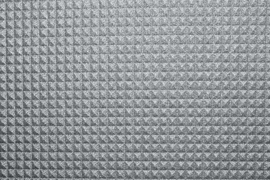 Gray yoga mat texture background.