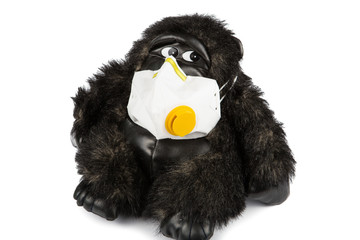 Soft toy gorilla sick wearing flu mask © nata_zhekova