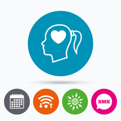 Head with heart sign icon. Female woman head