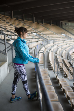 Woman runner doing stretching