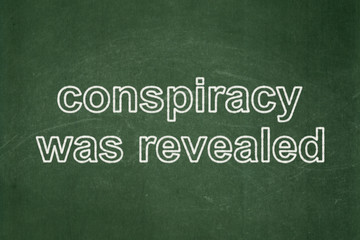 Political concept: Conspiracy Was Revealed on chalkboard background