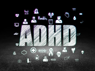 Medicine concept: ADHD in grunge dark room