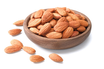dried almonds in wooden bowl