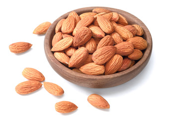 dried almonds in wooden bowl