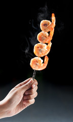 Shrimp skewers with sweet garlic chili sauce and smoke